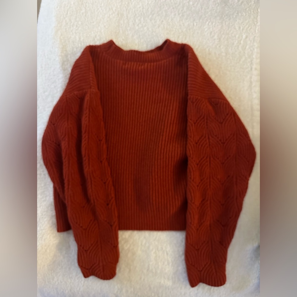 red-orange mock neck sweater